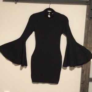 Long sleeve black dress with flared sleeves